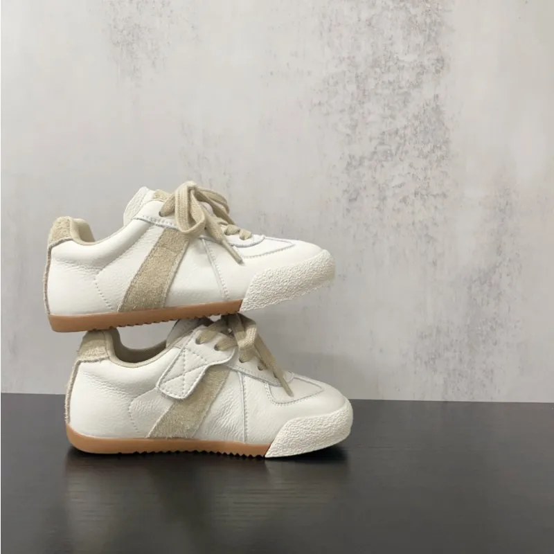 

2025 Autumn New Children's Sports Shoes Soft soled Non slip Genuine Leather Board Shoes Men Women's Casual Training Shoes 26-37