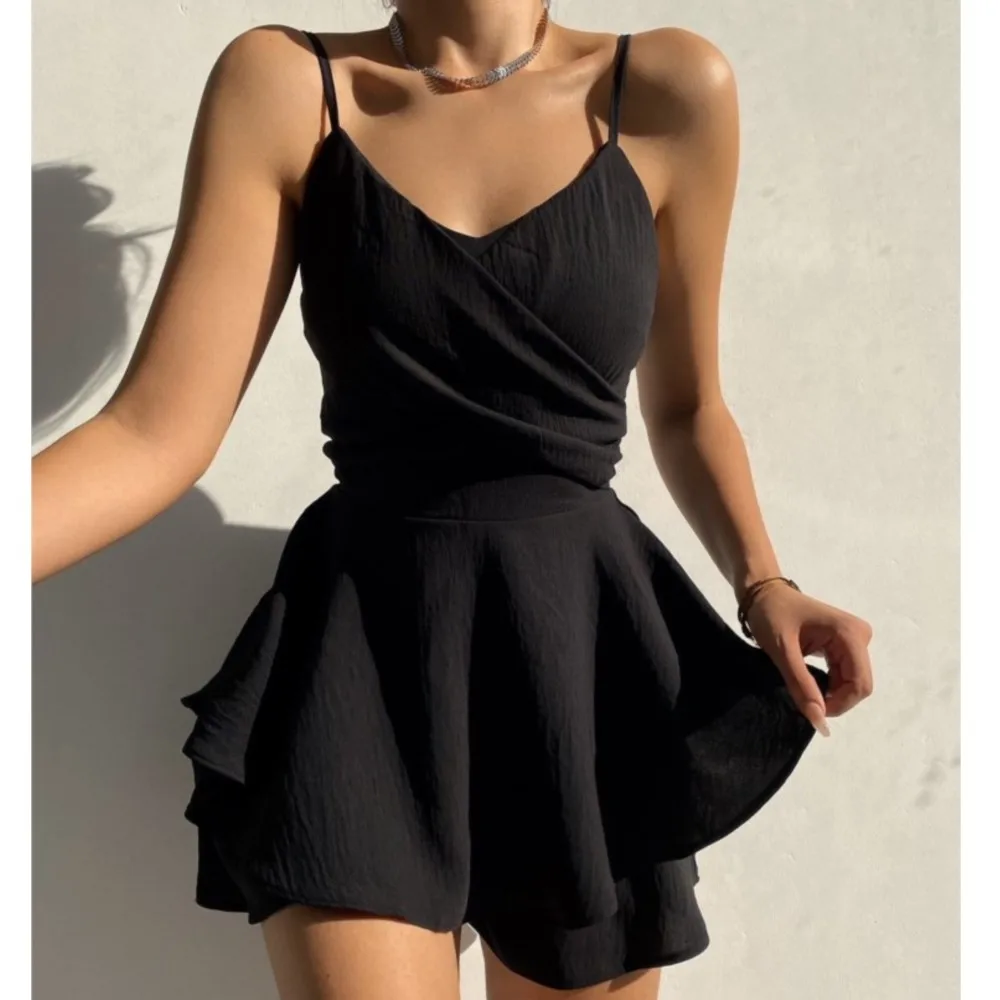Sexy V-neck Sleeveless Camisole Zipper Jumpsuit Summer New Women's Fashionable Solid Color Casual Irregular Ruffle Edge Jumpsuit