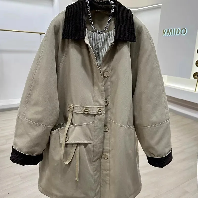 Corduroy lapel หนาผ้าฝ้ายเบาะ Trench Coat ผู้หญิงฤดูหนาวใหม่ขนาดกลางและยาวหลวมผ้าฝ้ายเบาะ