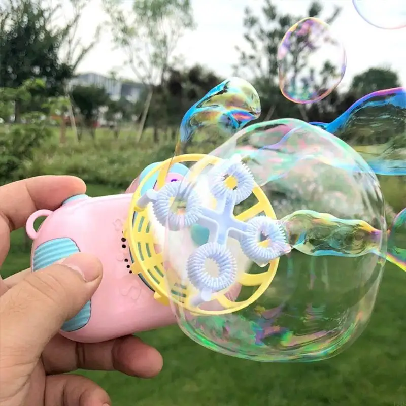 Kids Musical Bubble Machine giocattolo con colorato design del fan raffreddamento leggero per feste compleanno Famiglia
