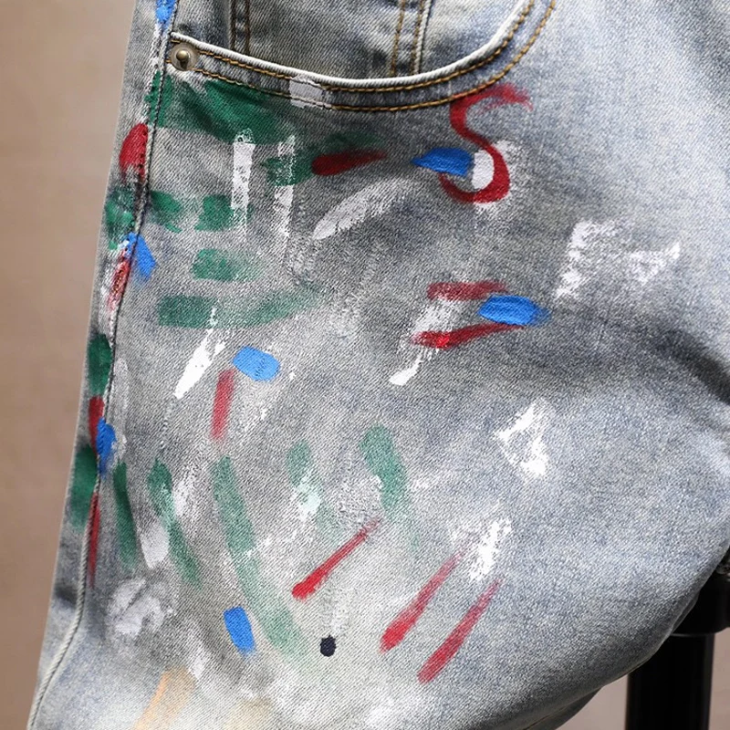 Pantalones vaqueros rasgados pintados ajustados elásticos azules lavados Retro a la moda de diseñador callejero para hombre Y2K Hip Hop Vintage pantalones vaqueros