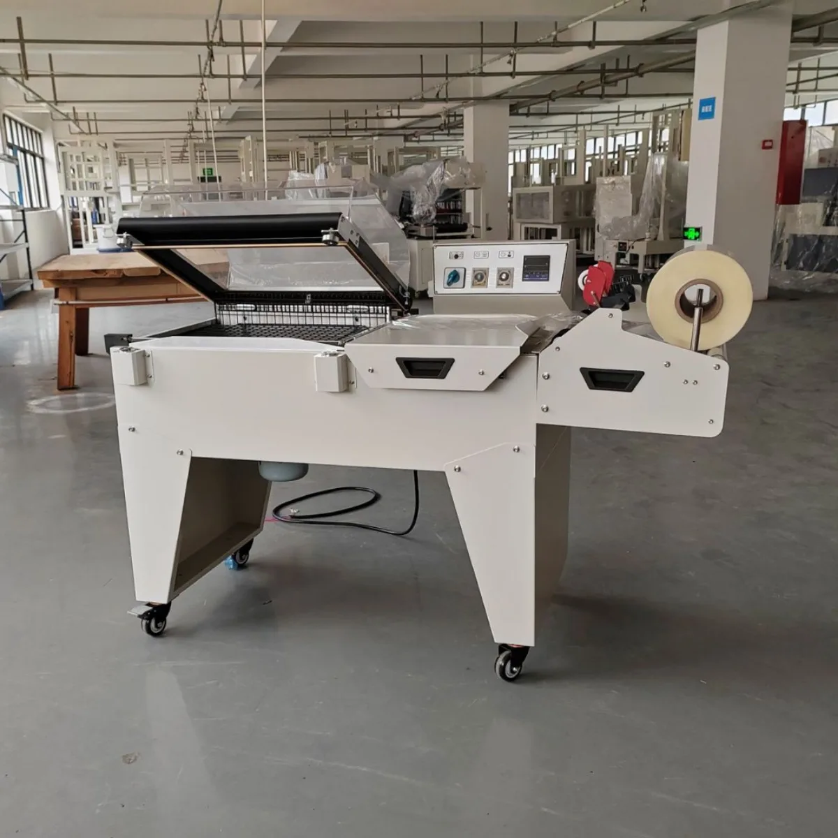 

2 in 1 Fm-5540 Heat Shrink Packing Machine PE Plastic Film Manual Sealing Cutting and Shrinking Wrap Machine