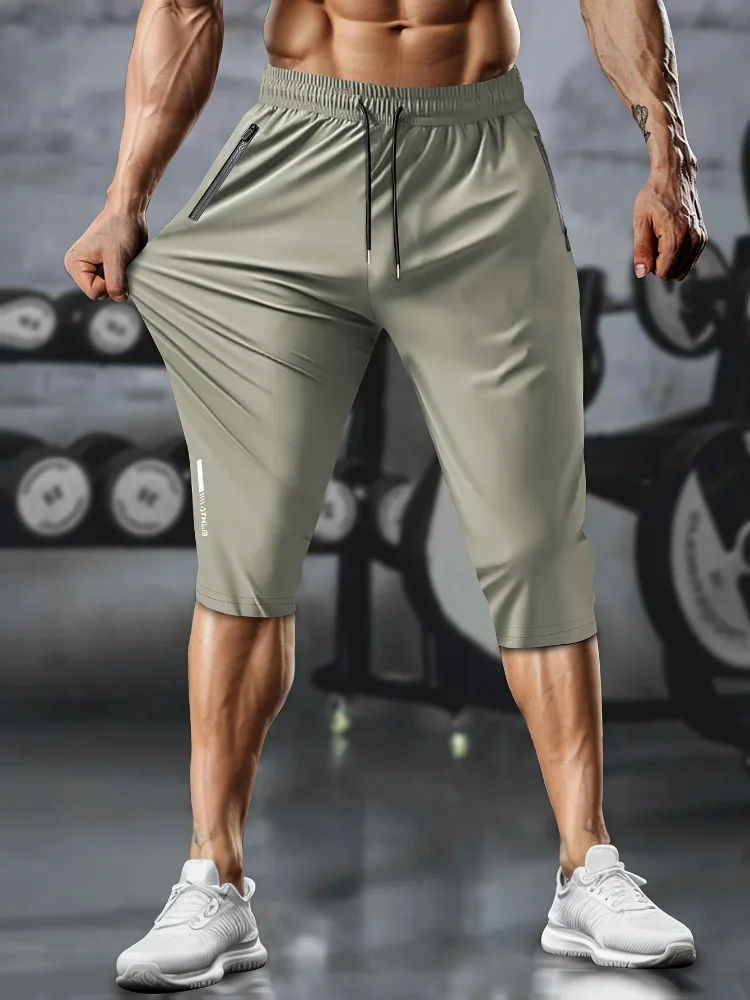 1 Stück leichte, sportliche, verkürzte Herrenhose mit Kordelzug, Reißverschlusstaschen und reflektierenden Streifen – atmungsaktives, schnell trocknendes Material – Detail 7
