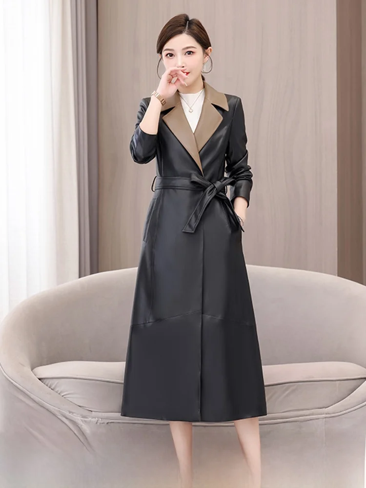 Cappotto da donna in vera pelle di pecora Haining, lunghezza media, con cintura, snellente, autunno inverno, nuovo stile, per pendolari, manica lunga