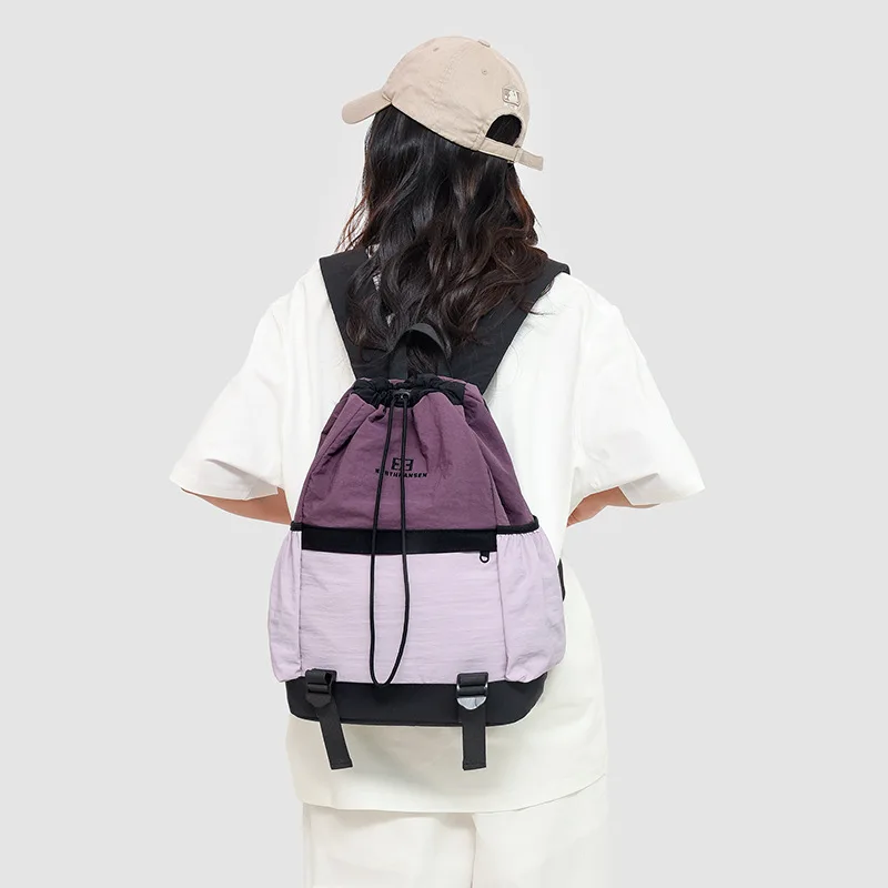 Waterproof nylon light backpack pull rope strap mouth schoolbag for boys and girls color large capacity travel backpack