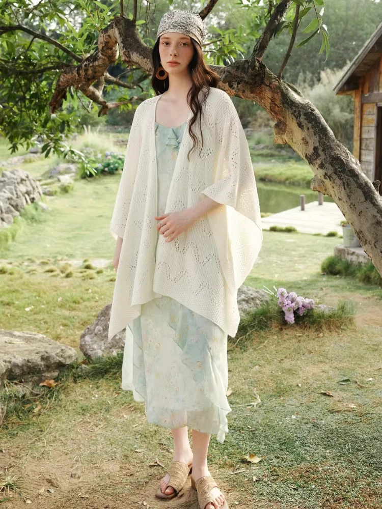 سترة نسائية محبوكة من OLrain سترة مفرغة على الطراز الفرنسي لربيع 2026 سترة فضفاضة غير متماثلة بحاشية غير متماثلة O58CZ002390