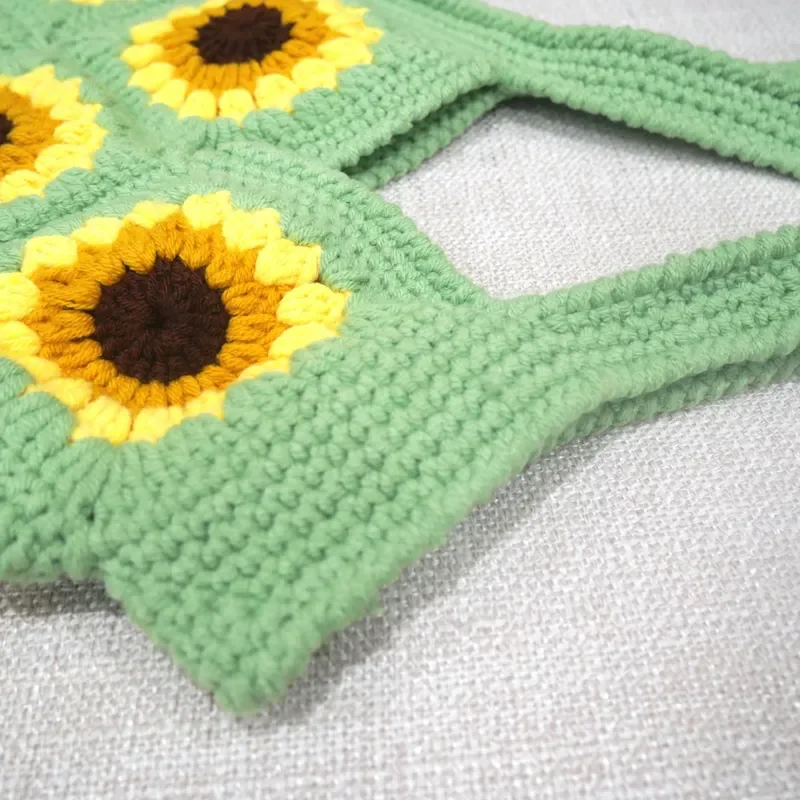 Sunflower-shaped handwoven straw handbag for women made of natural wool blend ideal for beach vacation and daily commuting view 4