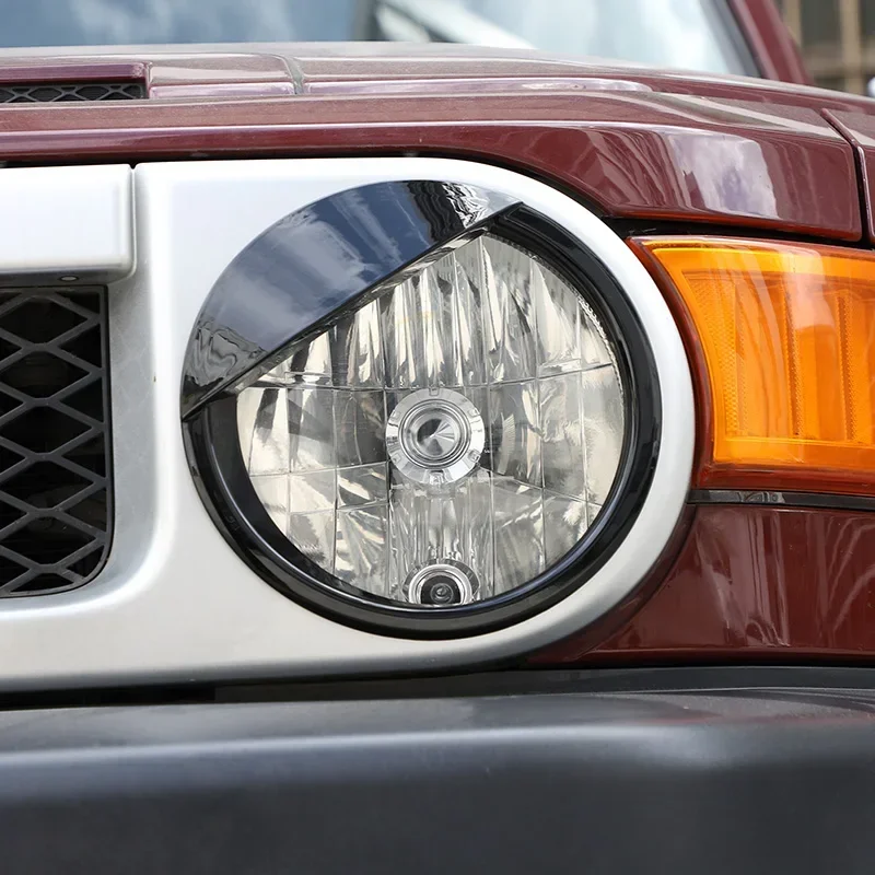

2Pcs ABS Matte black For 2007-2021 Toyota FJ Cruiser car shape headlight decoration sticker car exterior protection accessories