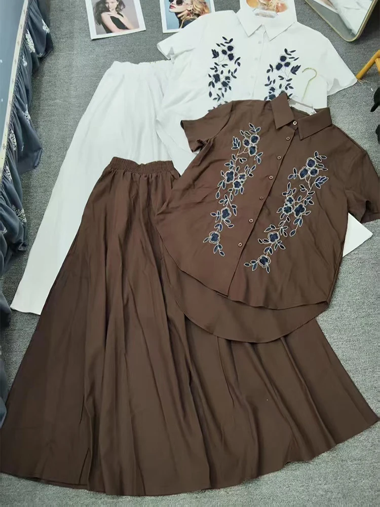 Camicia monopetto a maniche corte ricamata retrò primavera ed estate nuova + gonna in vita elastica abito a due pezzi da donna alla moda