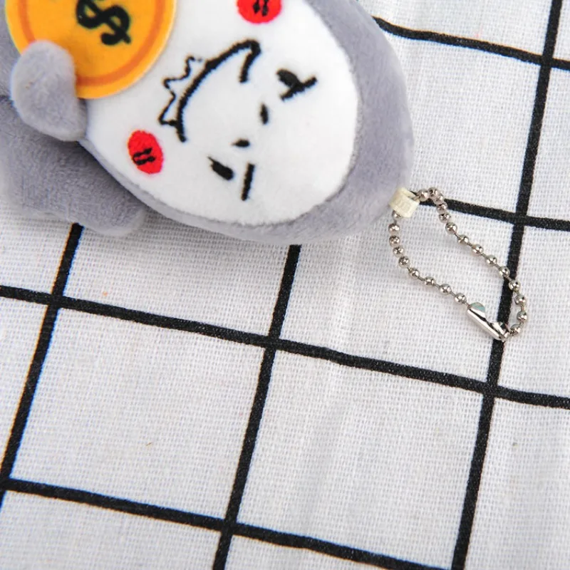 10 Cm tiburón sosteniendo dinero mochila de felpa colgante novedoso llavero de coche colgante de equipaje de dibujos animados de felpa muñeca divertida regalo de mano