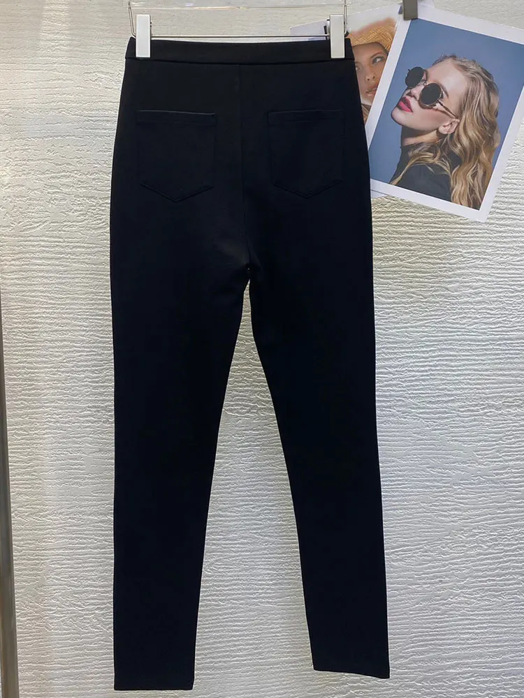 Retro spring 2026 new black metal buckle women's feet pants fashion Joker wear bottoming high waist elastic magic pencil pants.