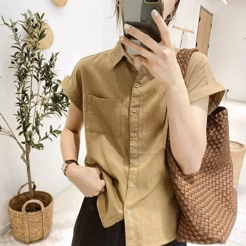 Korean Blouse 2024 New Summer Women\'s Fashion Loose Casual Polo-Neck Spliced Pockets Button Short Sleeve Solid Color Shirt Tops