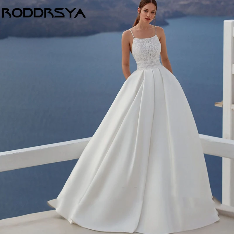 RODDRSYA-Robe de mariée dos nu à bretelles spaghetti sexy, élégante, appliques en satin, fête de la mariée, ligne A simple, poche insérable, surintendant wjurRobe de mariée dos nu à bretelles spaghetti sexy, élégante,