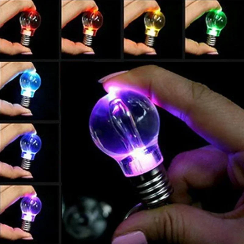 มินิน่ารักพวงกุญแจสัมผัส 7 สีเปลี่ยนหลอดไฟ LED พวงกุญแจของเล่น