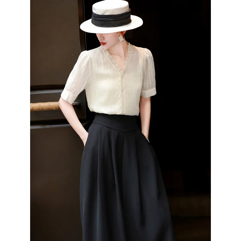 

MEXCOCO 2026 Summer Elegant Ruffle V Neck Puff Short Sleeve Lyocell Blouse High Waist Pleated A Line Midi Skirt 2 Piece Outfit