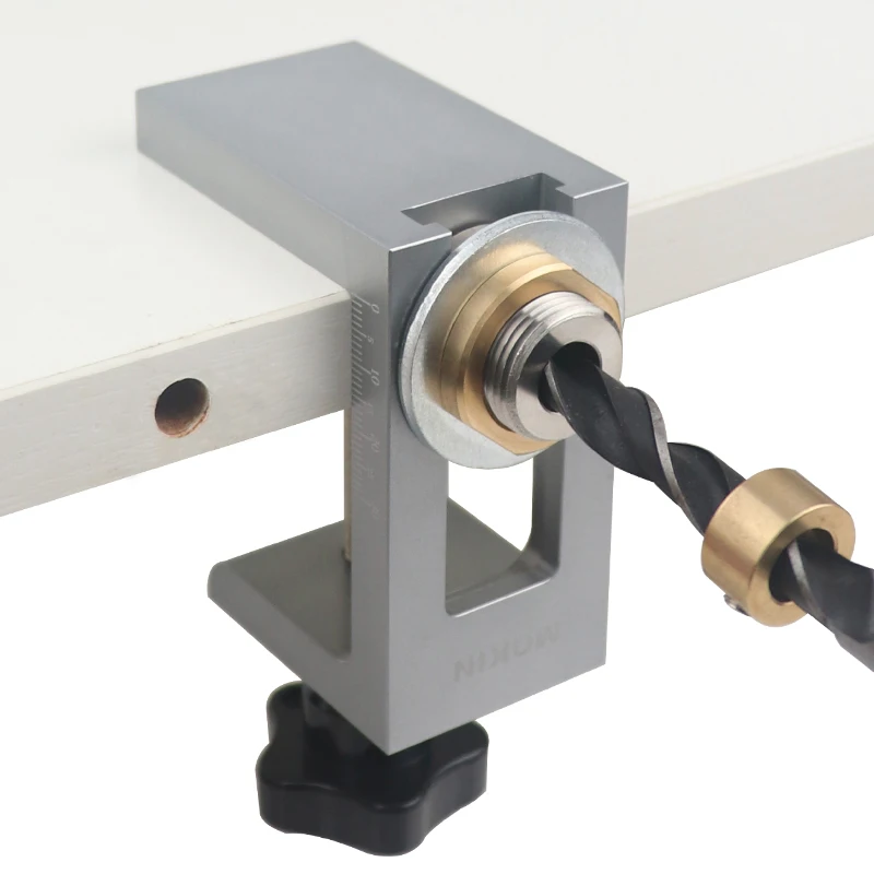 

Cabinet door concealed rebound device, punching device, layer plate support, drilling installation, concealed opening