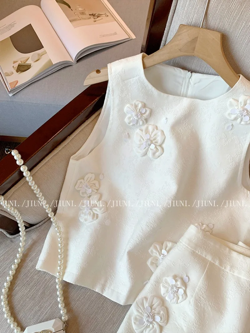 フランスの新しい小さな香りの良いツーピースセット レディース サマーファッション 3Dフラワー ノースリーブベストトップ + ミニスカート セレブリティパーティースーツ