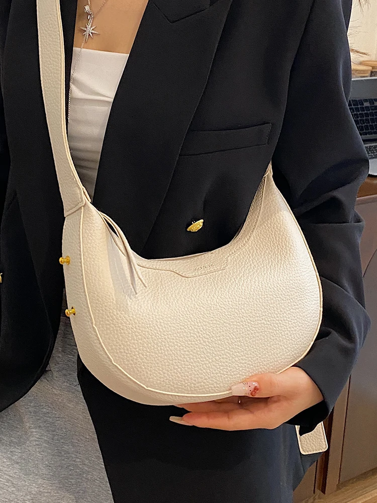 Luxury designer high-end fashion underarm bag female 2025 new wild popular one-shoulder messenger bag western style dumpling bag