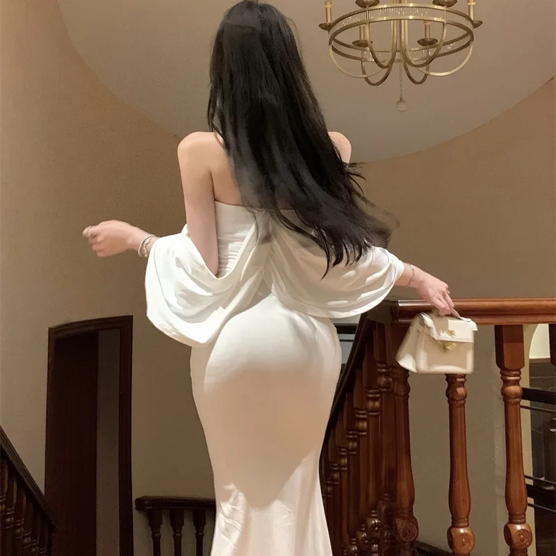 ชุดเดรสยาวสีขาว สายเดี่ยว ทรงหางปลา ดีไซน์เกาหลี เอวสูง แฟชั่นผู้หญิง รุ่นใหม่ล่าสุด ฤดูใบไม้ผลิ ฤดูใบไม้ร่วง