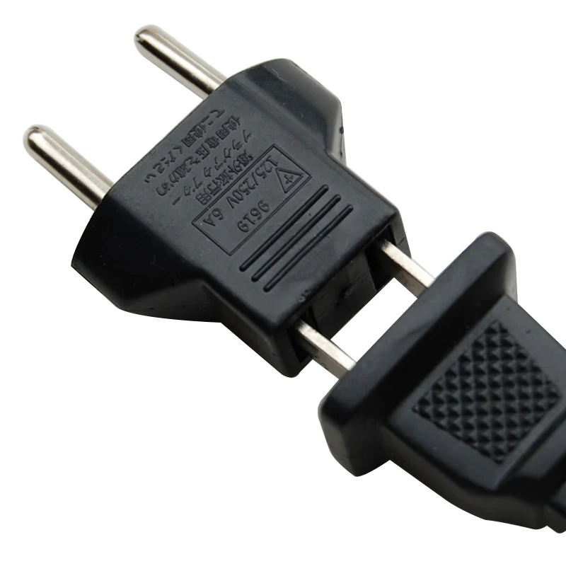 Black plastic US to European power converter