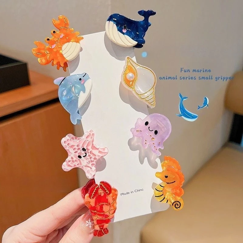 

Милая заколка для волос в виде морских обитателей: маленькая морская звезда, медуза, из смолы, для женских причесок, стильная, нескользящая, с сильной фиксацией, аксессуар для волос