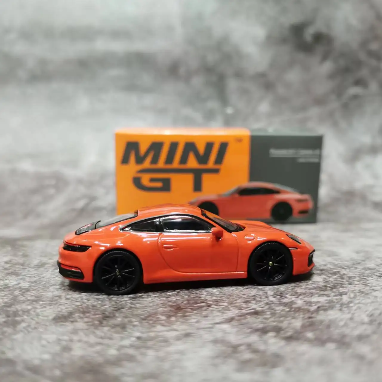 MINI GT 1:64  911 (992) Carrera 4S Alloy Die-Cast Model Car - Lava Orange MGT00371-LHD