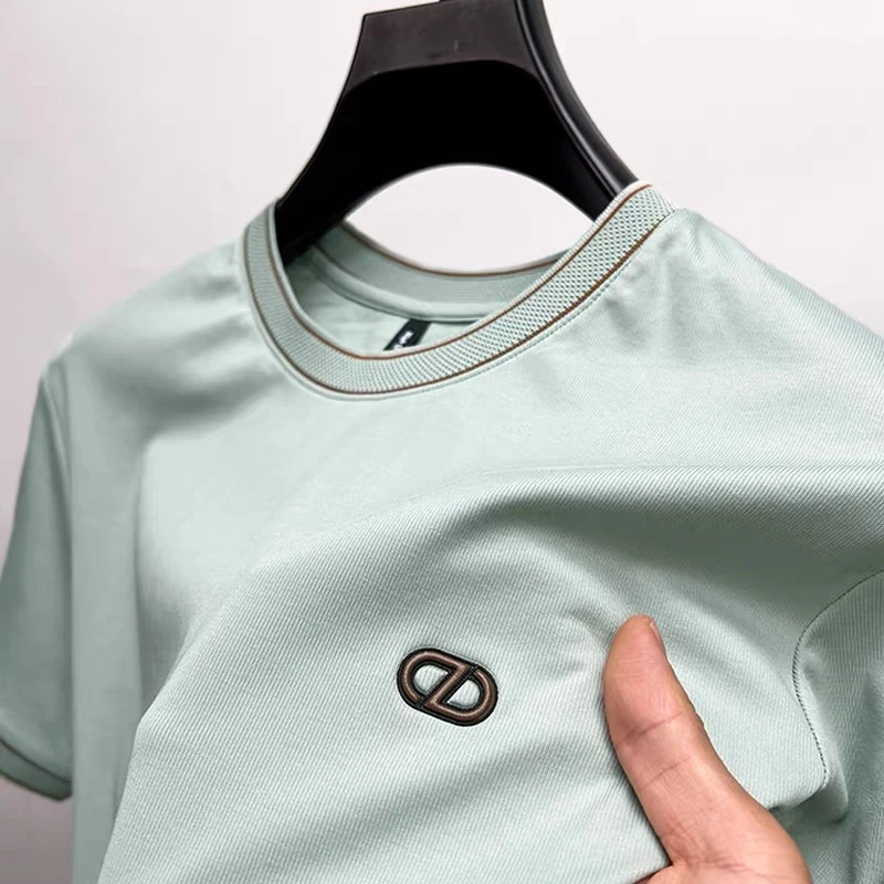 

High end solid color round neck T-shirt men's top summer trend loose Korean version youth casual breathable cotton short sleeve