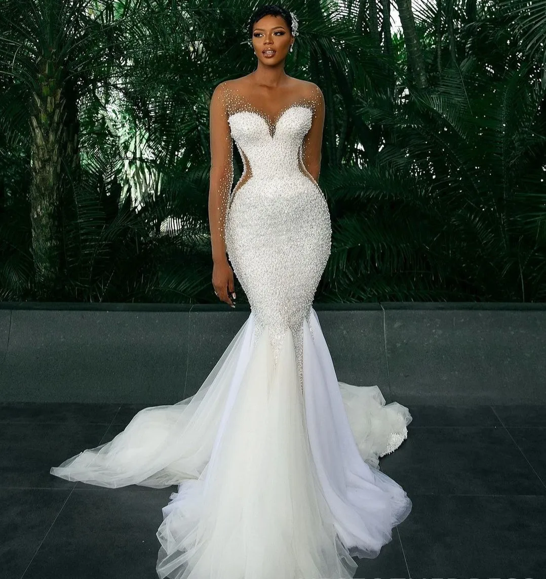 

2025 African Mermaid Wedding Dress Bridal Gowns For Bride Sheer Neck Illusion Long Sleeves Beaded Crystals Vestido De Noiva