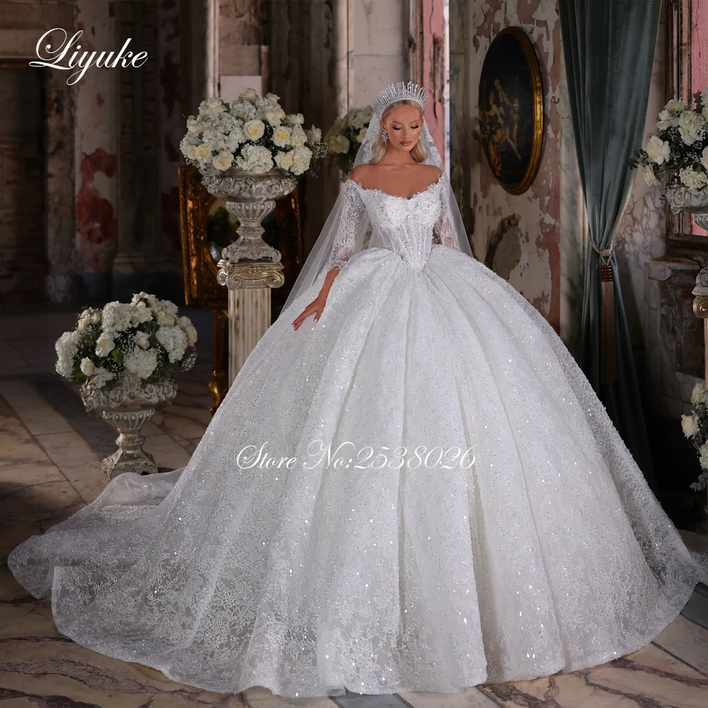 Liyuke مخصص خمر بلينغ الدانتيل مطرز اللؤلؤ الكرة ثوب فساتين الزفاف الوهم الرقبة ثلاثة أرباع منتفخ زي العرائس