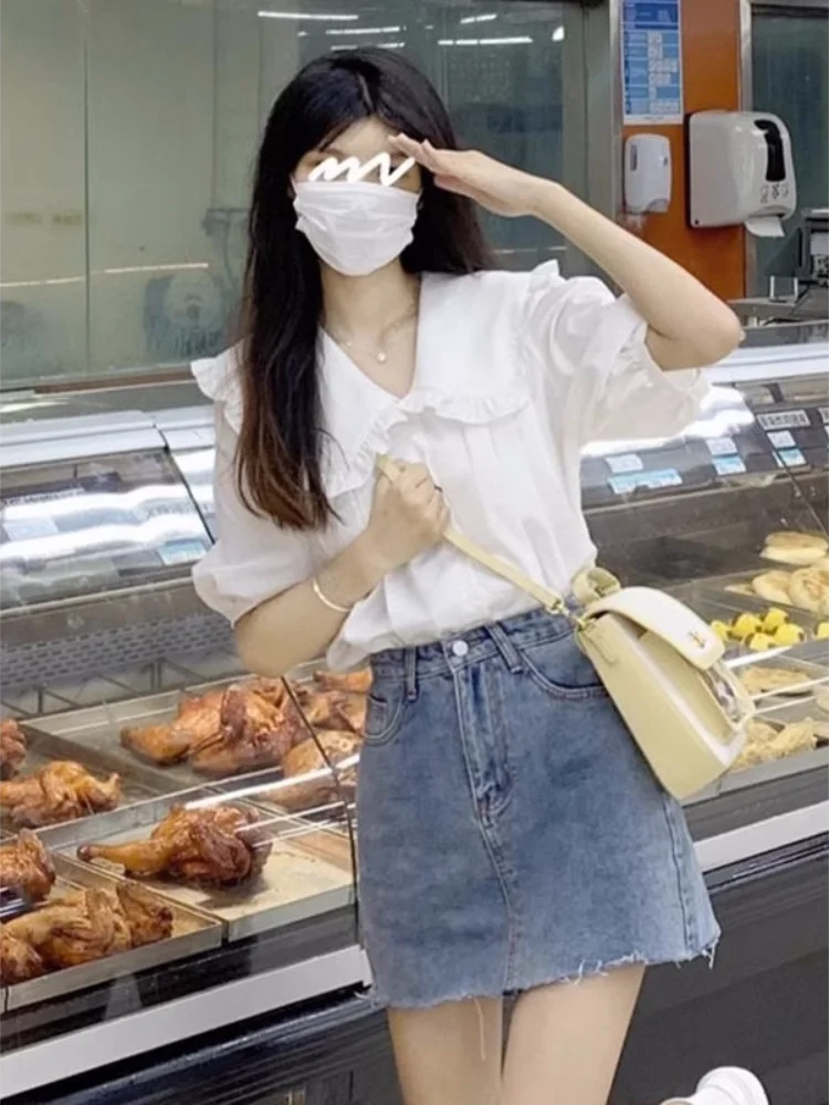 Blanc ort Sve col de poupée irt avec bois ain pour les femmes été Faionable coréen Sle coupe ample bouton détail