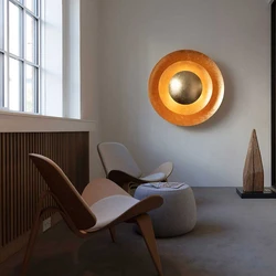Artistic and creative wall lamp designer, simple and luxurious corridor bar bar solar eclipse atmosphere flying saucer wall lamp
