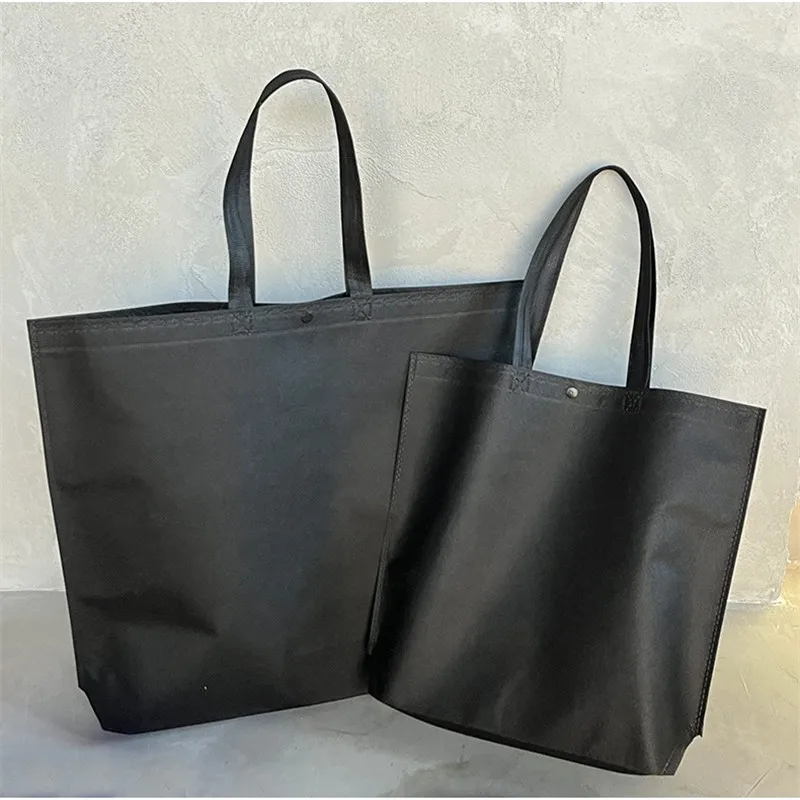 StoBag 10pcs borsa per la spesa in tessuto Non tessuto nero Tote borsa regalo riutilizzabile impermeabile in tessuto portatile Logo personalizzato