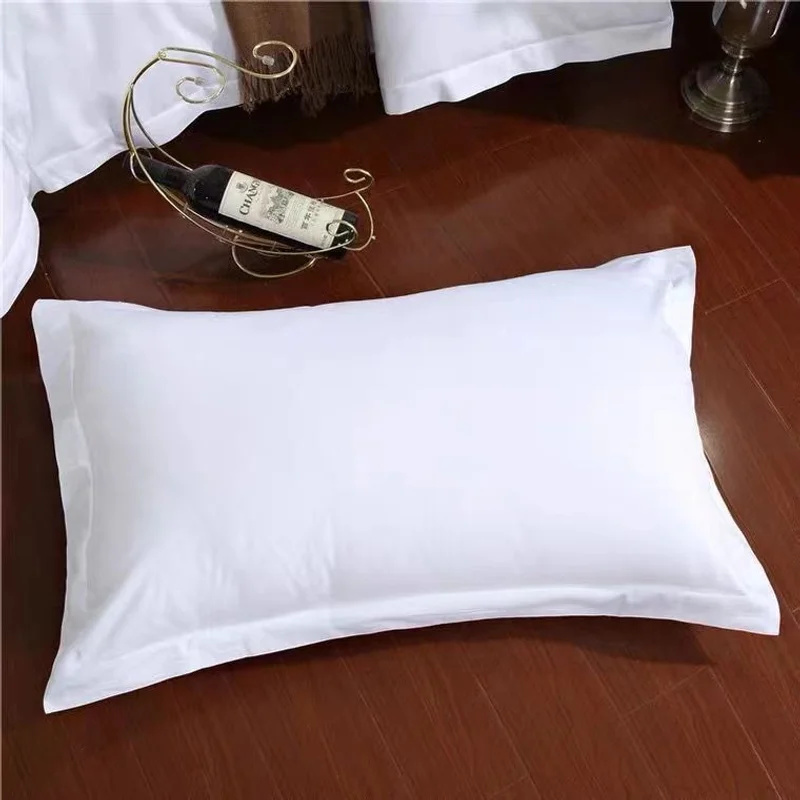 A pair of white pillowcases for hotels, inns, and guesthouses, single pure white pillowcases for single or double beds