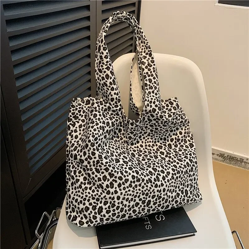 Bolso de lona con estampado de leopardo y viento para estudiantes universitarios, bolsa de hombro de gran capacidad para mujer, 2024