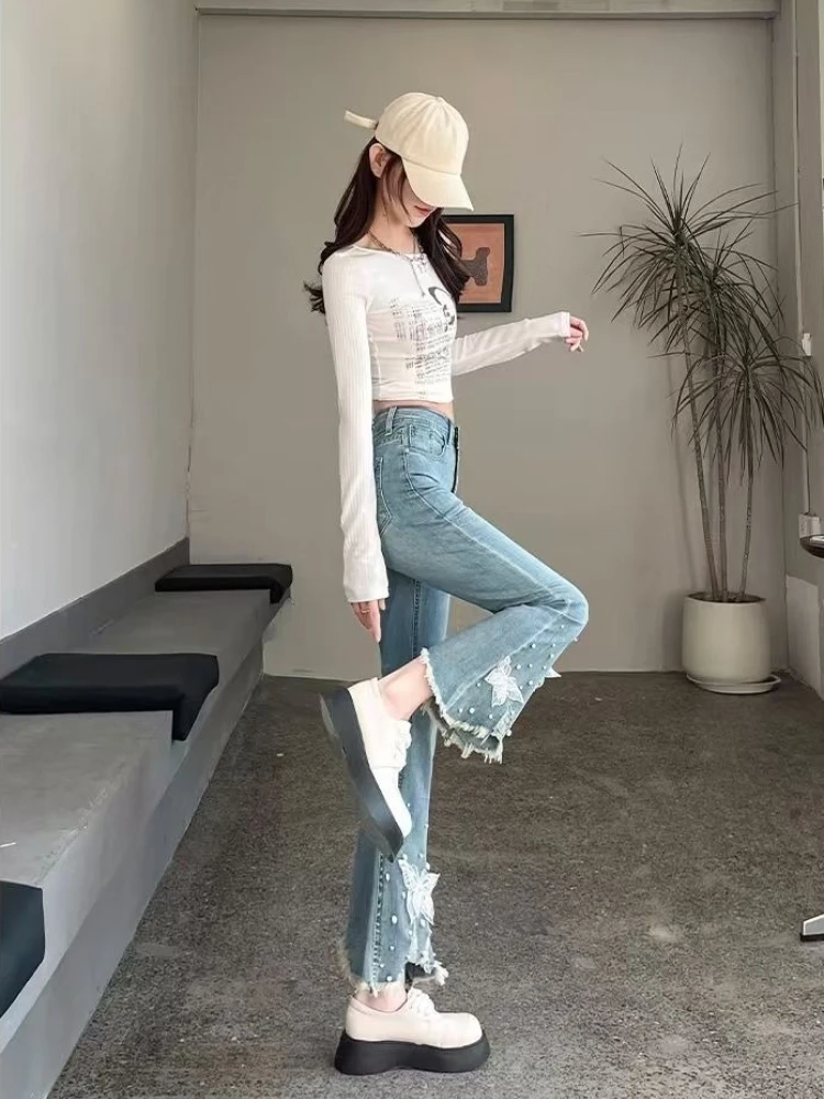 

2026 Spring Summer Women Flared Jeans Distressed Hem Stretch Fit Beaded Butterfly Design Nine-Part Trousers