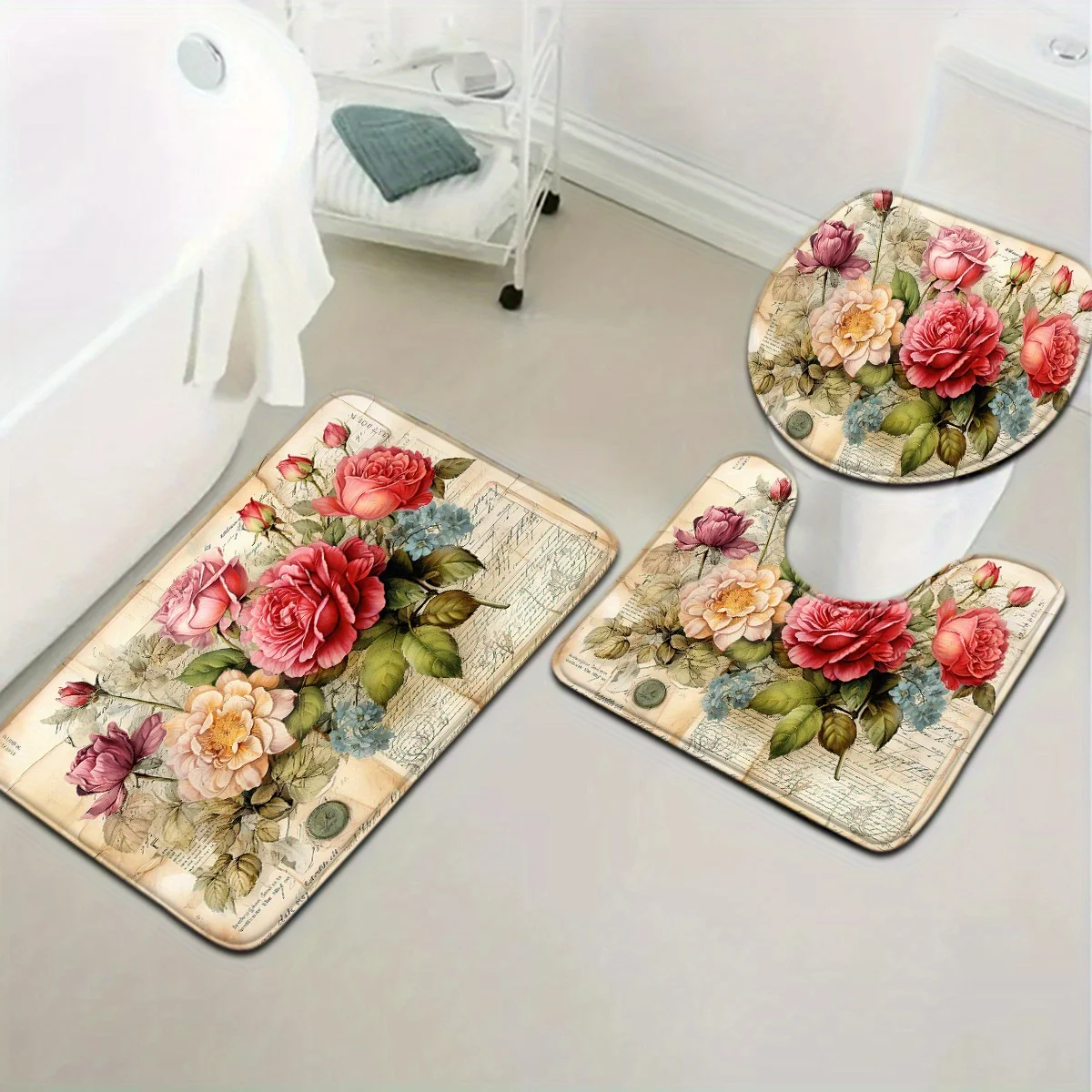 3-piece Botanical Collection bath mat set with newspaper rose pattern, toilet seat cover and U-shaped foot mat. Machine washable