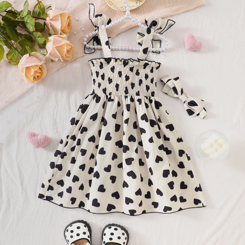 Girls' summer bowknot camisole dress with heart print, ribbed splicing, casual style, and hairband