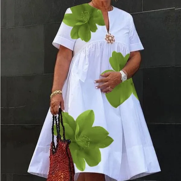 

Women's summer new 2025V neck pleated short-sleeved loose flower print casual dress on white background