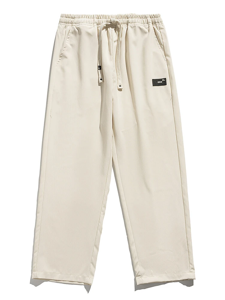 

Мужские повседневные брюки, прямые свободные брюки с эластичной резинкой на талии, корейские классические синие, черные, серые мужские брендовые брюки, большие размеры 4XL 5XL