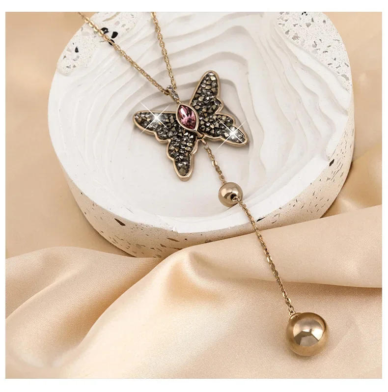 

2025 новая легкая роскошная цепочка для свитера с бабочкой и микроинкрустацией, элегантный длинный кулон-колье