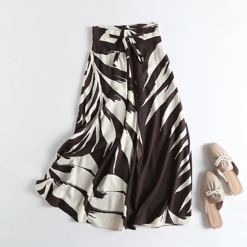 กระโปรงผ้าลินินลายป่าฝนเขตร้อนทรงเอไลน์เอวสูงผูกโบว์ ความยาวปานกลางสำหรับผู้หญิง