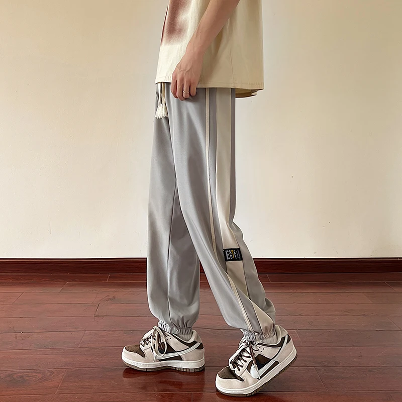 

Новые мужские тонкие повседневные брюки из ледяного шелка 2024 года, свободного кроя, весенне-летние, легкие, для подростков, в корейском стиле, с манжетами