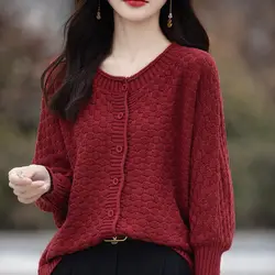 Spring and Autumn Sweater Women's New Splicing O-Neck Button Solid Color Loose Fashion Elegant Casual Long Sleeved Knitted Top