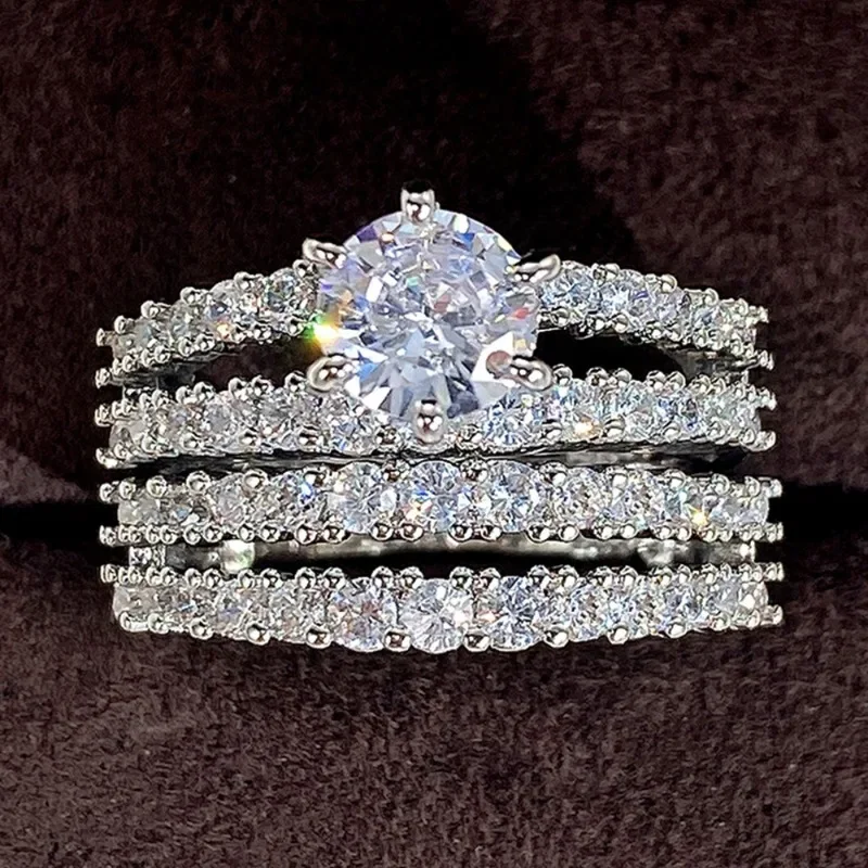 خواتم فاخرة فضية اللون معدنية من الحجر الأبيض مجموعة خواتم زفاف خطوبة عصرية رائعة للنساء مجوهرات