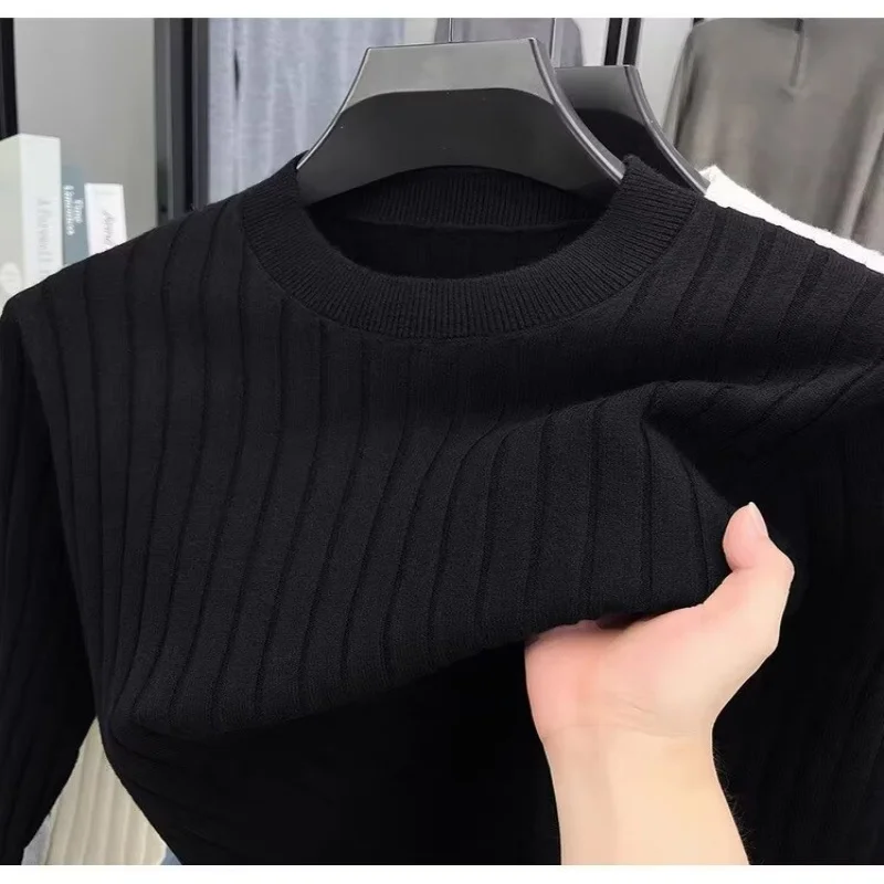 Autumn new solid color long sleeved sweater men's round neck casual base shirt, young and middle-aged thin loose knit sweater