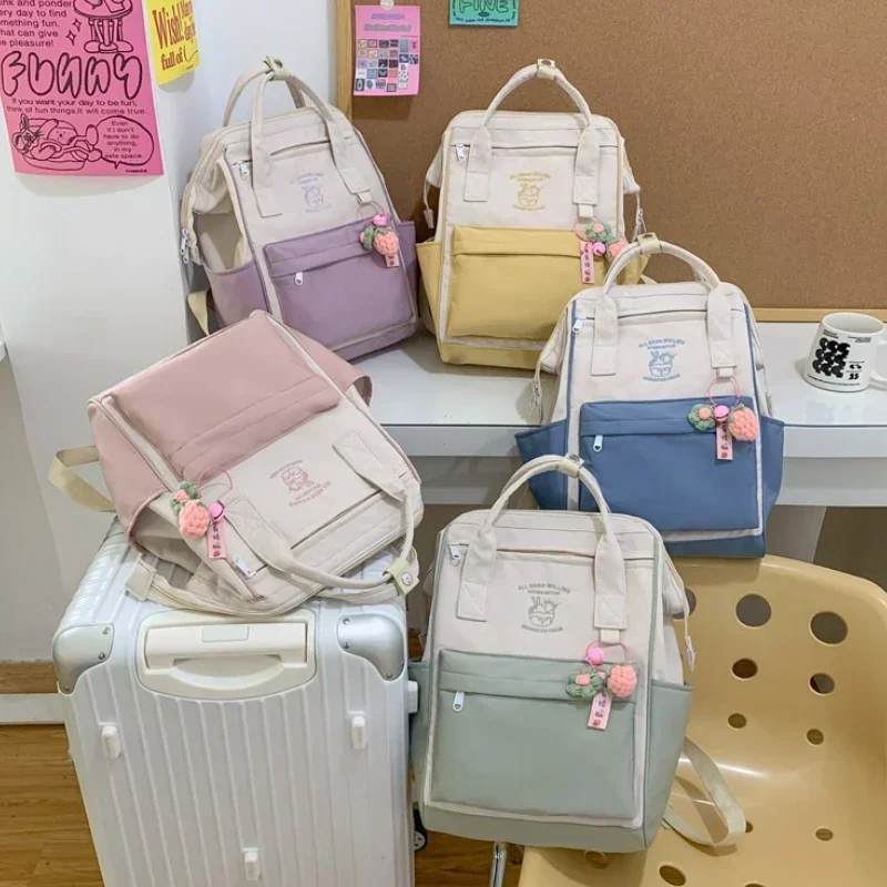 حقيبة مدرسية ذات سعة كبيرة لطلاب المدارس الثانوية مطابقة الألوان بسيطة مقاومة للماء على ظهره حقيبة تخزين للسفر الترفيهي