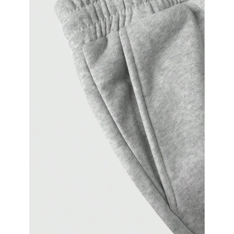 As calças esportivas de perna reta de cor sólida são adequadas para todas as estações outono e inverno, ajuste solto, unissex e casual de rua