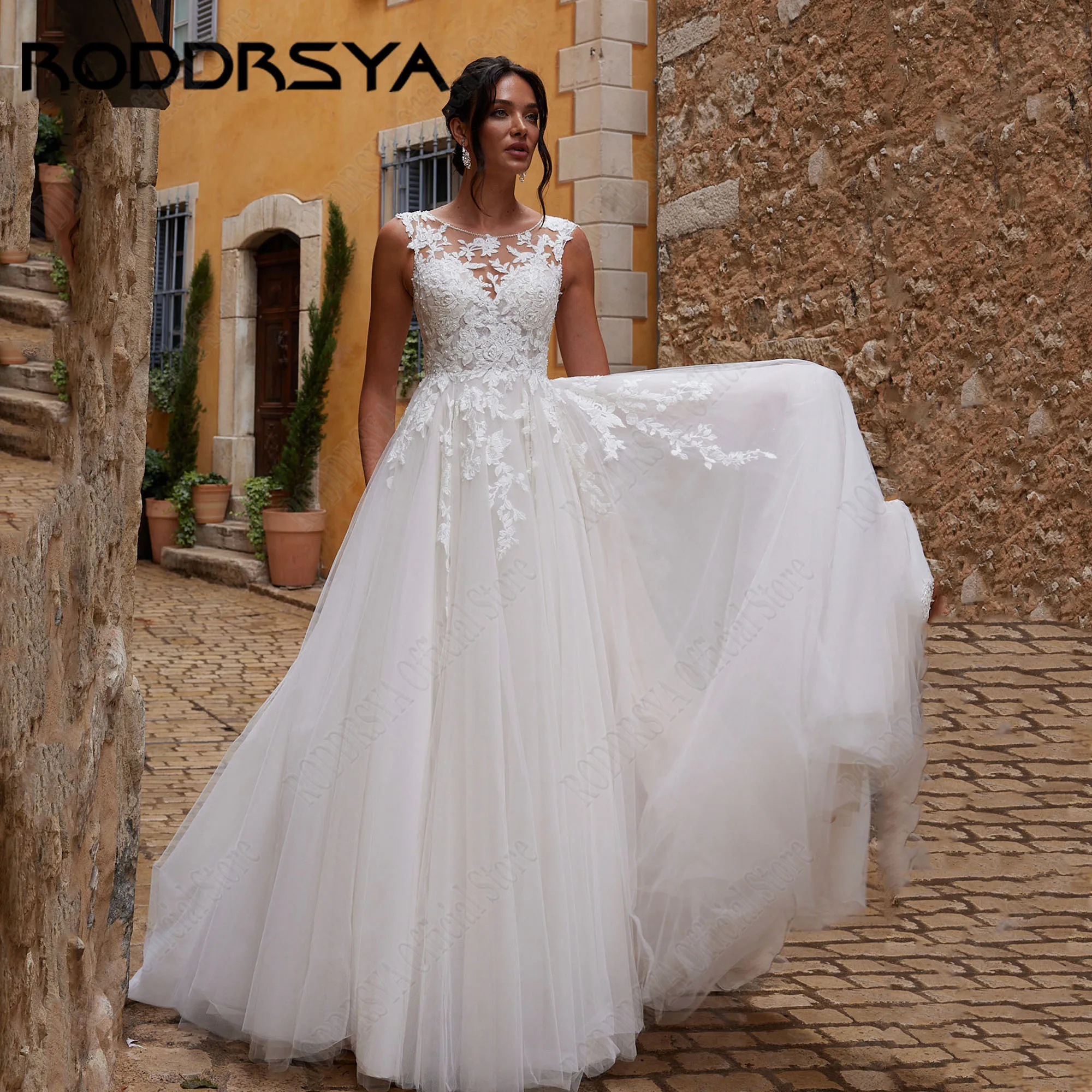 

RODDRSYA Wedding Dress Women Elegant Sleeveless O-Neck Applique Lace A-Line Bride Gowns Plus Size Button Back Tulle Sweep Train