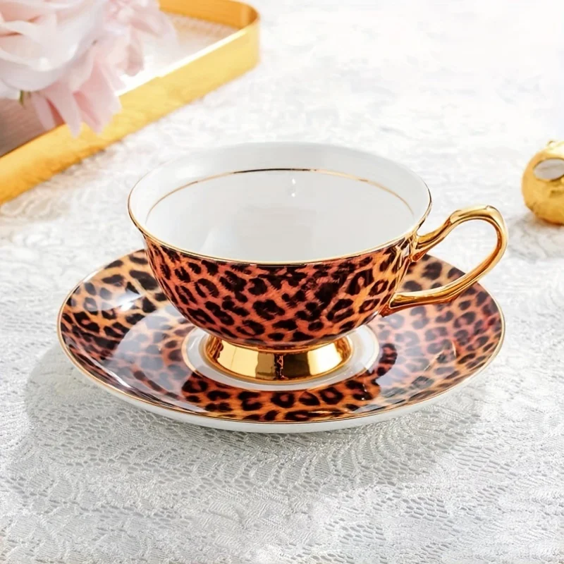 

Luxurious Leopard Print Tea Set: Elegant Bone China Cup And Saucer with Golden Trim, Perfect for a Stylish Afternoon Tea