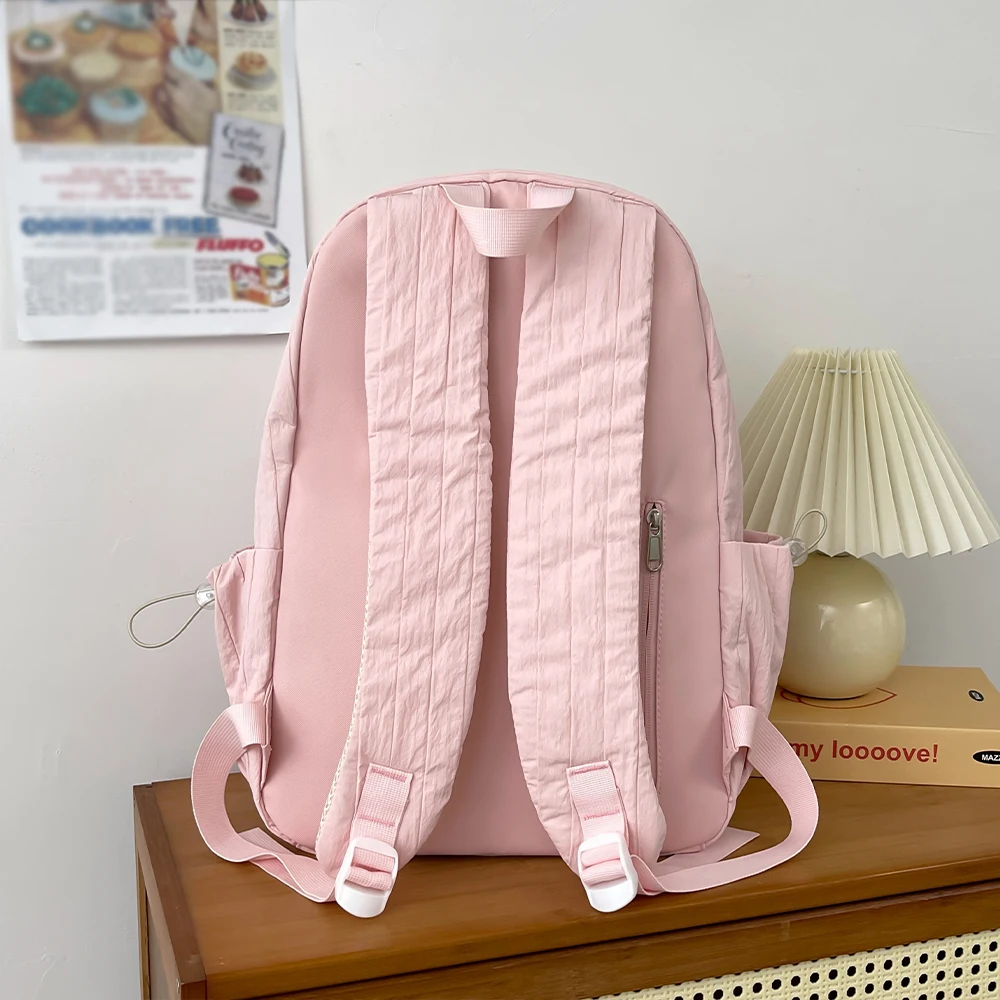 Lightweight schoolbag female college student niche design simple and versatile backpack primary and secondary school students casual travel backpack